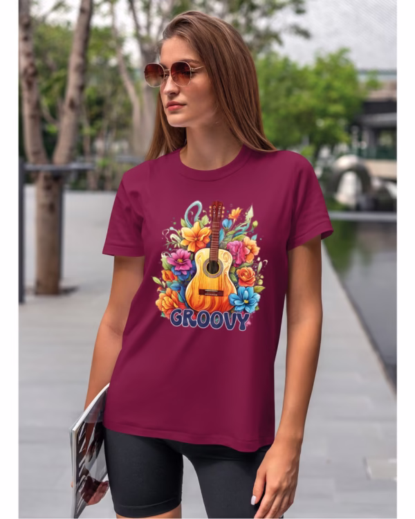 Koszulka unisex "Odlotowa gitara – brzmienie, które unosi", dla niej – wybierz kolor!