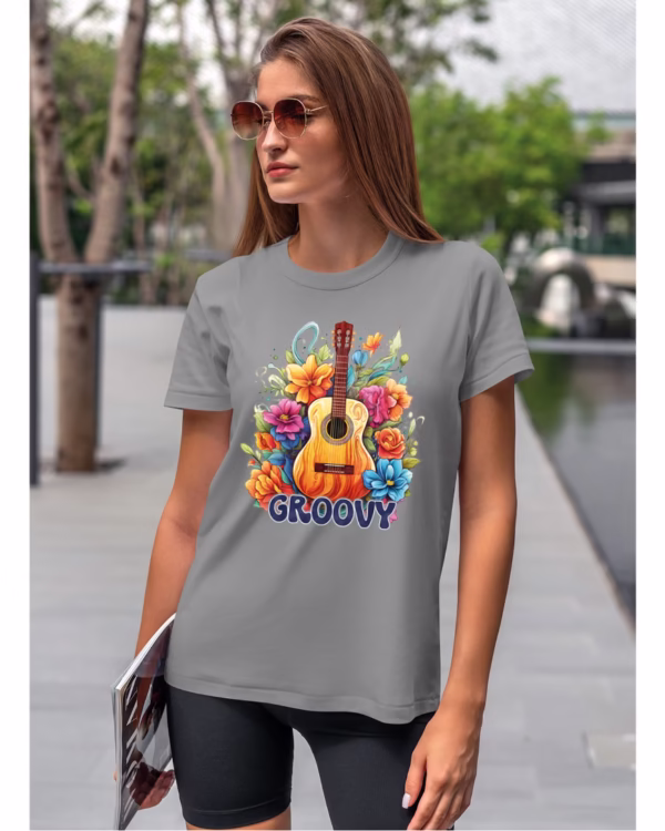 Koszulka unisex "Odlotowa gitara – brzmienie, które unosi", dla niej – wybierz kolor!