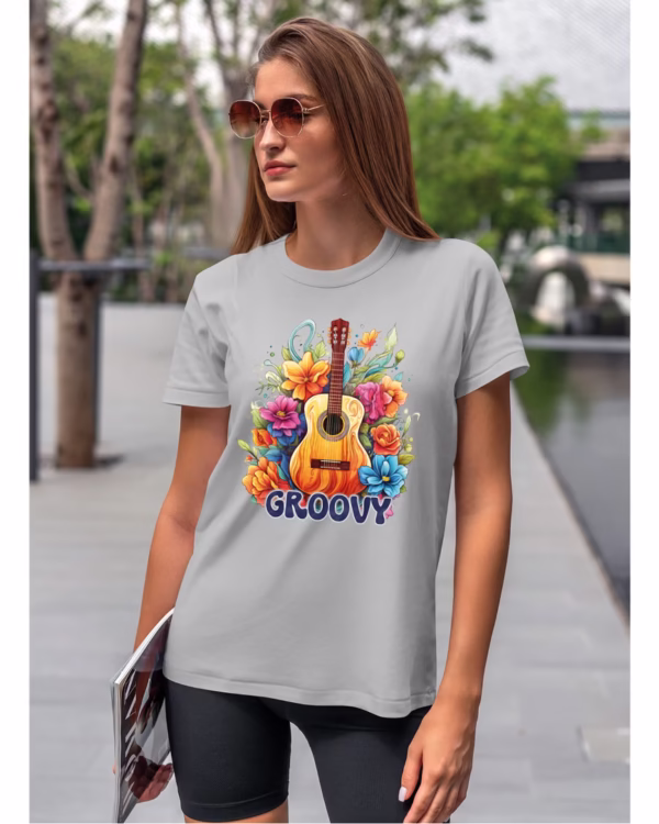 Koszulka unisex "Odlotowa gitara – brzmienie, które unosi", dla niej – wybierz kolor!