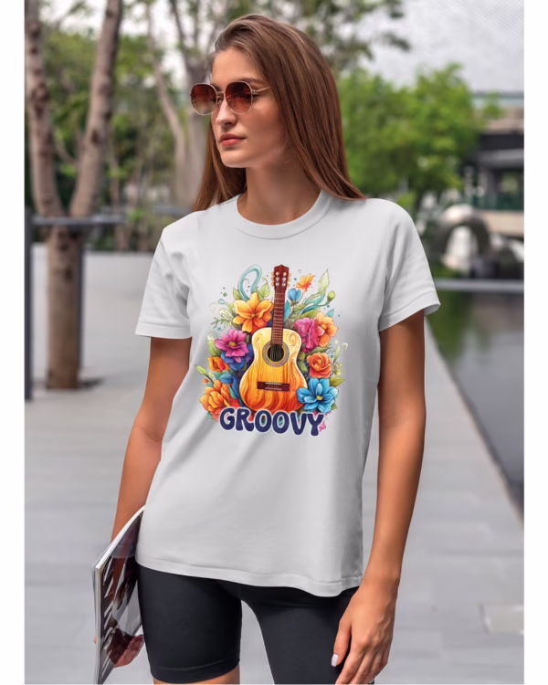 Koszulka unisex "Odlotowa gitara – brzmienie, które unosi", dla niej – wybierz kolor!