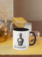 Czarno-biały kubek z napisem Elixir of Bitter Sorrow